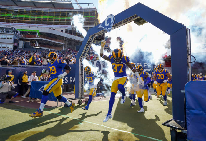 Entering the field with Aaron Donald for the season finale.